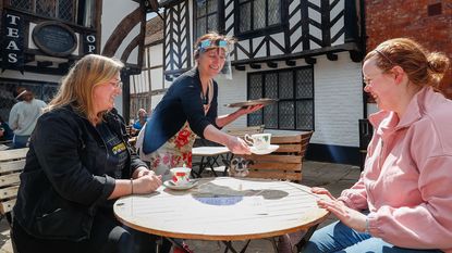 Waitress serving customers