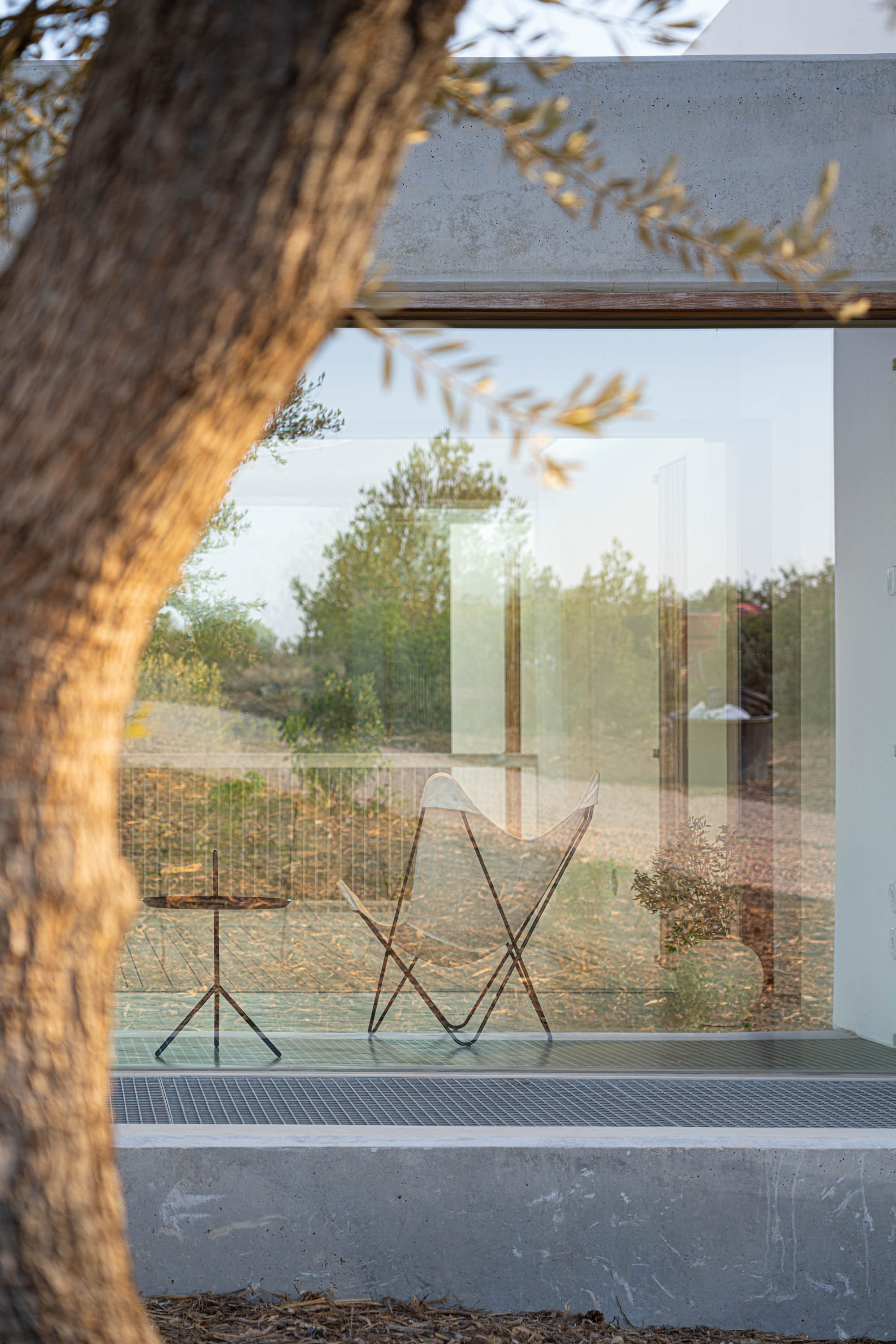 Formentera House by Mari&amp;agrave; Castell&amp;oacute;, a white concrete structure in the countryside