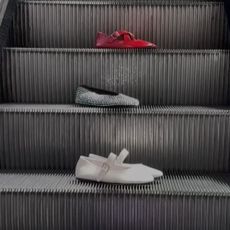 Tony Bianco shoes on an escalator