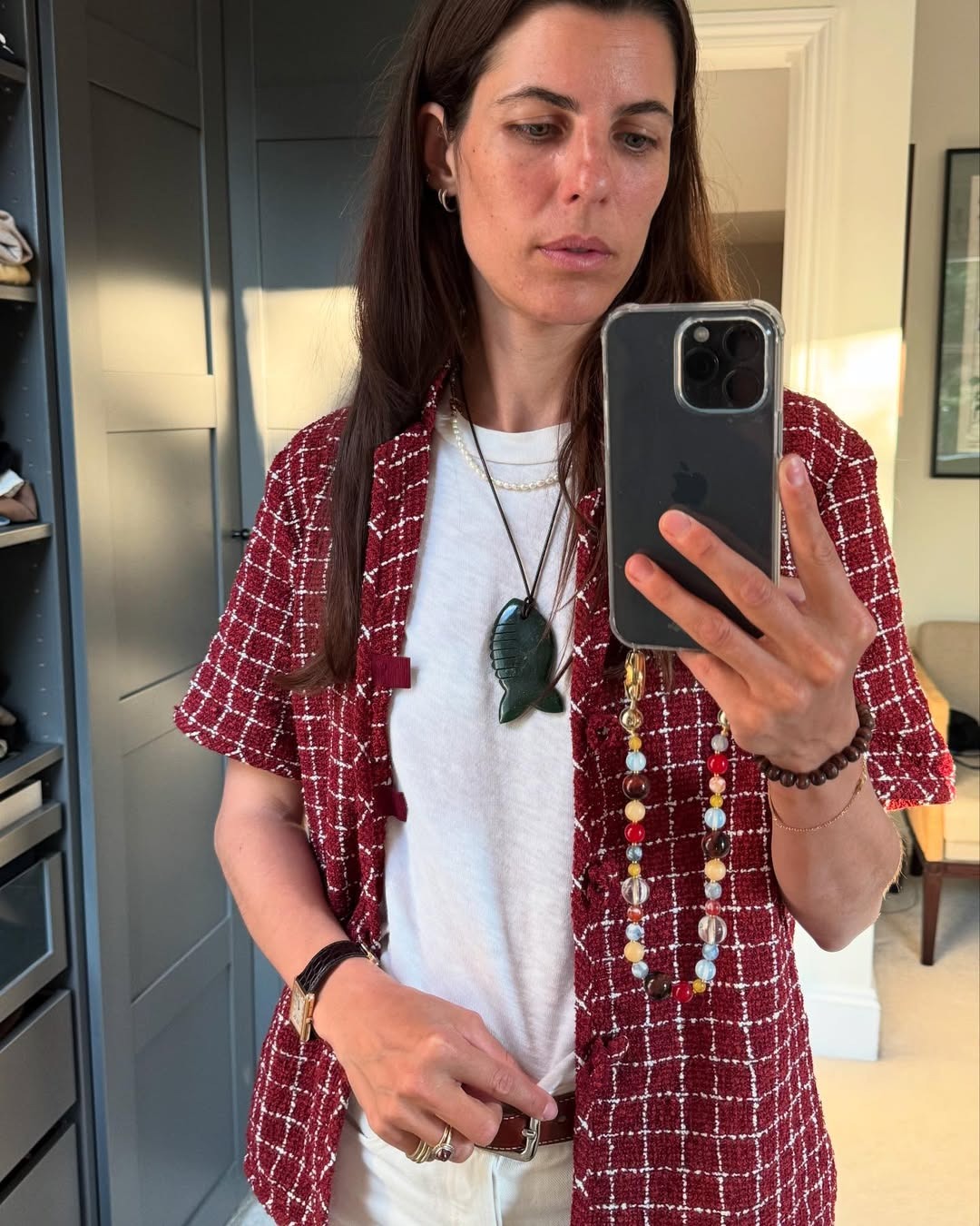 Woman wearing a fish comb necklace