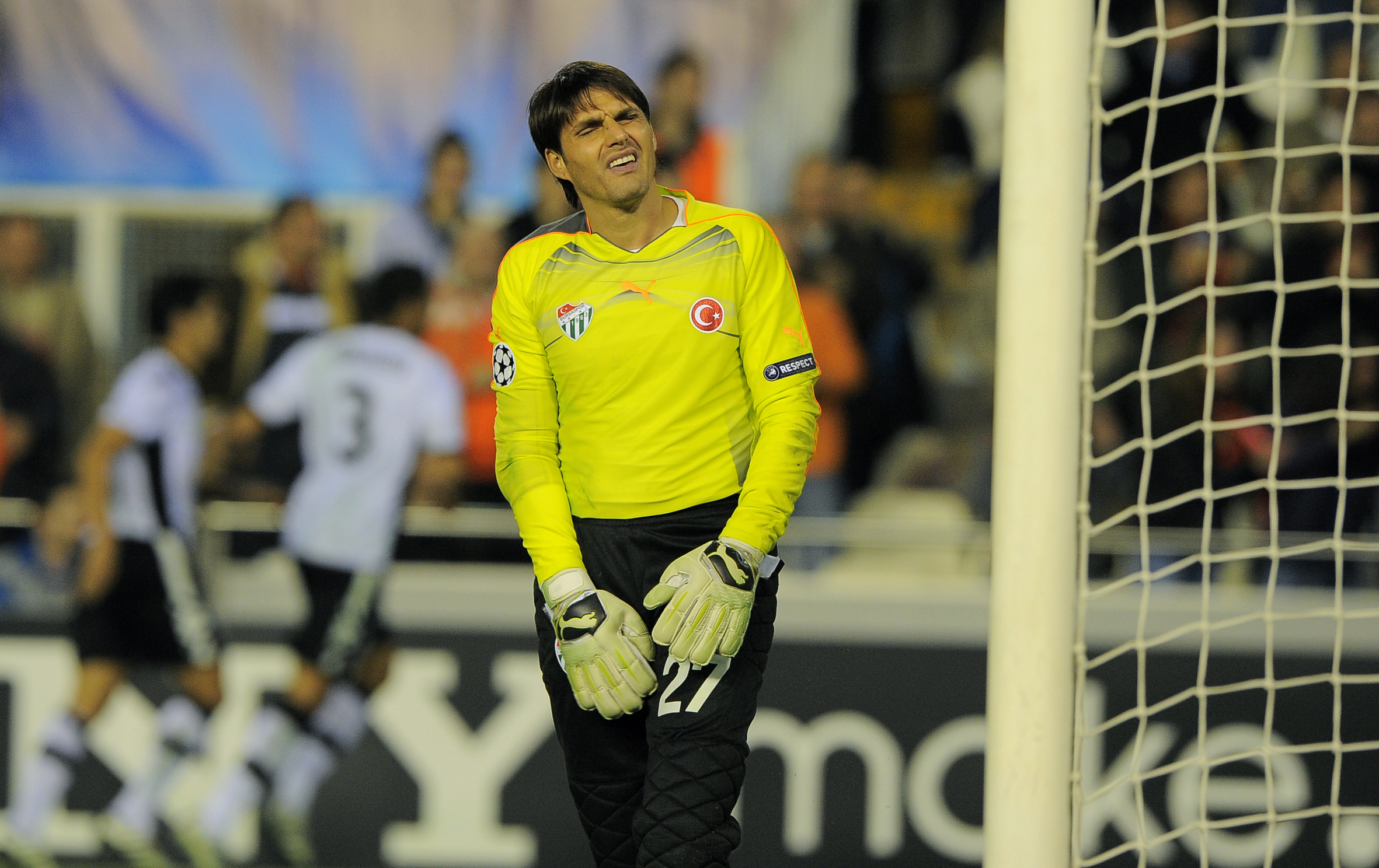 Bursaspor goalkeeper Dimitar Ivankov reacts after conceding a goal against Valencia in November 2010.