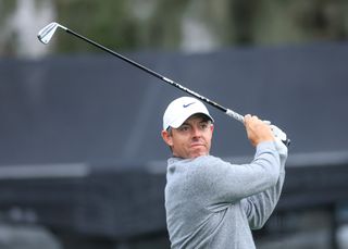 Rory McIlroy hits an iron shot