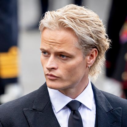 Marius Borg Hoiby wearing a suit at King Harald's funeral