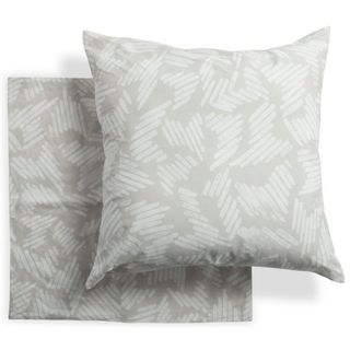 Two light gray printed pillow shams for Drew Barrymore's furniture collection.