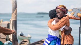 Lupita Nyong'o hugs Madina Nalwanga in Queen of Katwe
