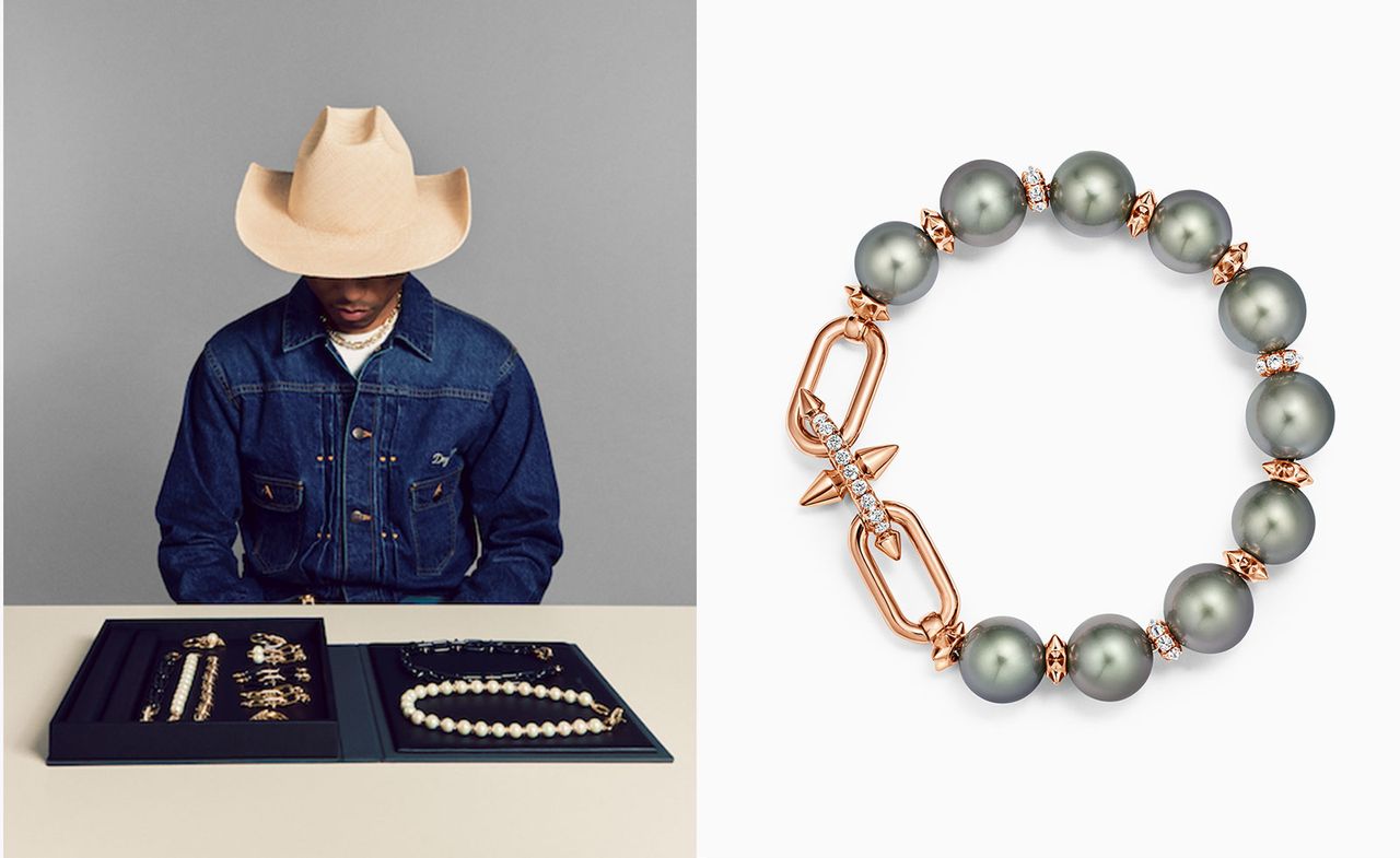 Pharrell Williams in cowboy hat looks at pearl and gold Tiffany &amp; Co jewellery and 