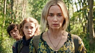 (L-R) Noah Jupe as Marcus Abbott, Millicent Simmonds as Regan Abbott, and Emily Blunt as Evelyn Abbott in &quot;A Quiet Place Part II&quot;