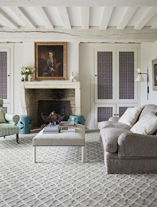 Living room with patterned carpet by Britons