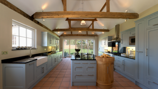 Kitchen with exposed beams