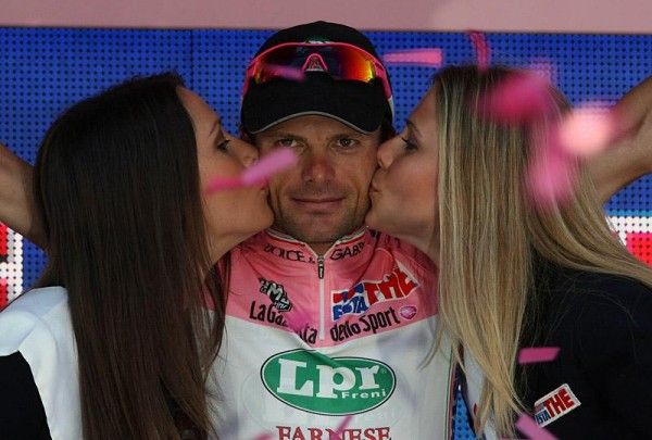 Danilo Di Luca (LPR Brakes) on the podium after receiving a fresh leader's jersey.
