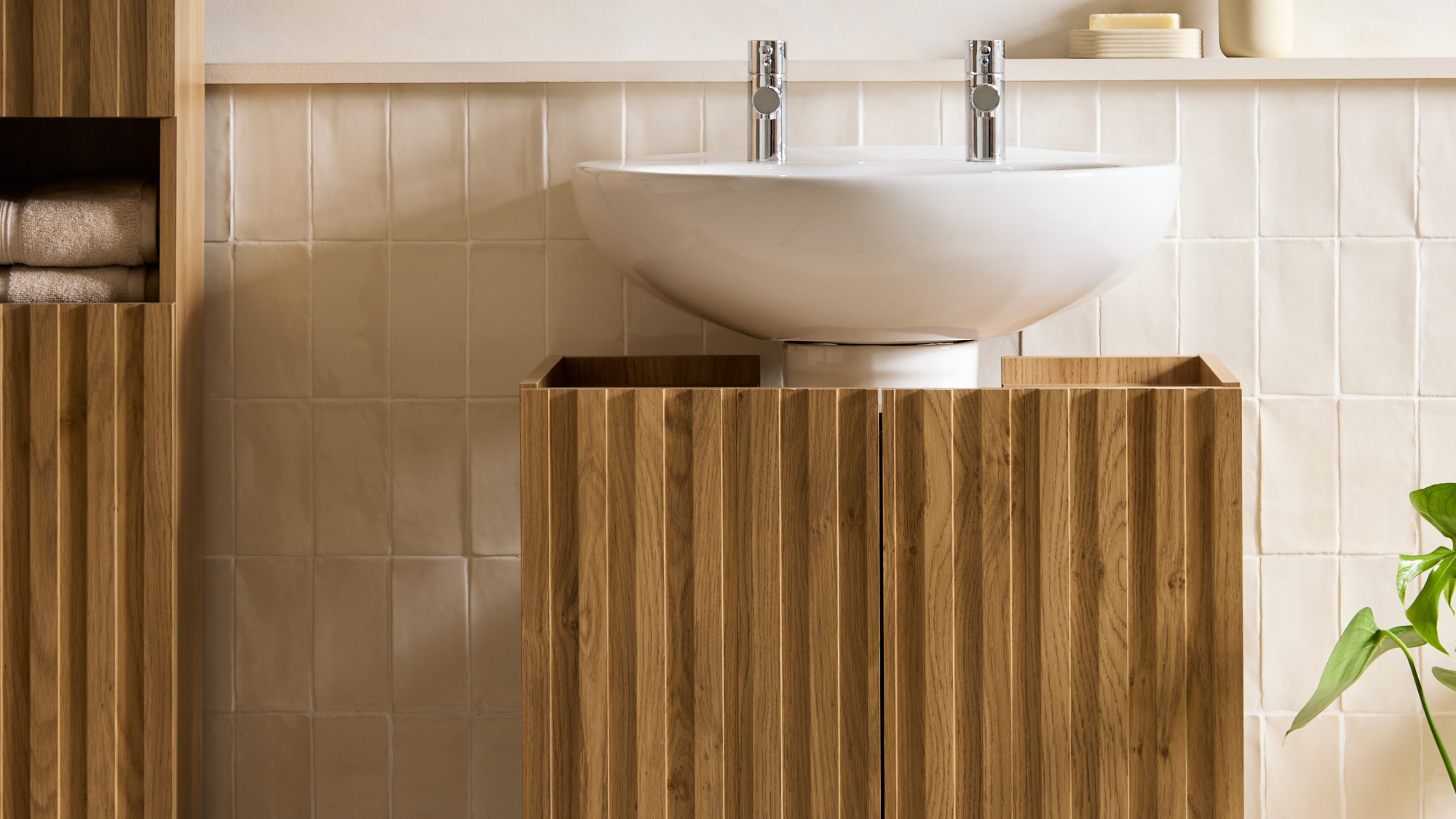 A bathroom storage basin unit