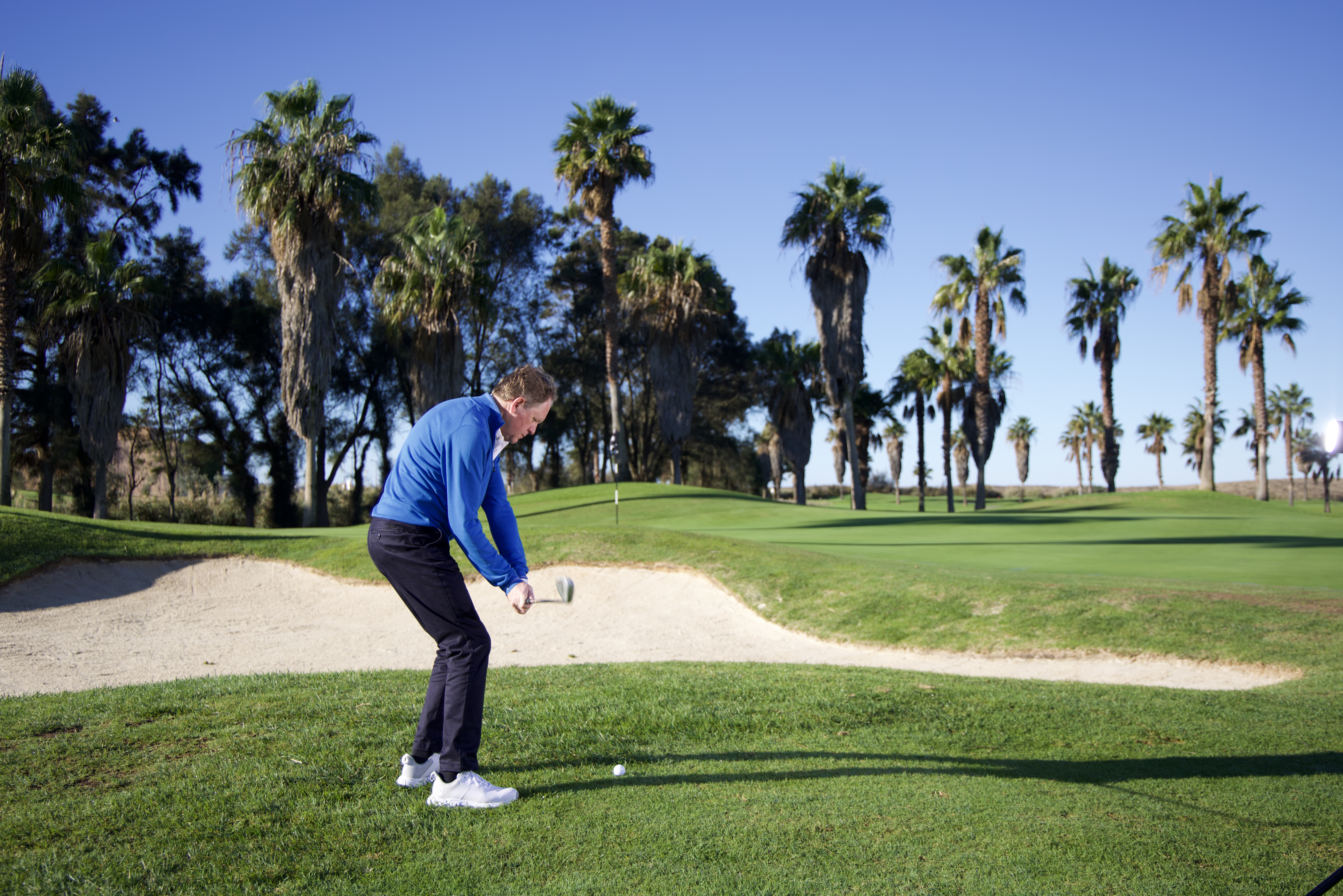 Keith Wood hitting a lob shot over a greenside bunker