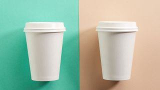 two white take away coffee cups