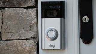 Ring doorbell camera mounted on a door frame