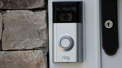 Ring doorbell camera mounted on a door frame