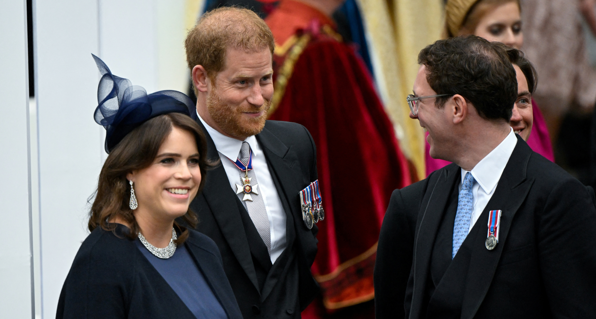 Prince Harry, Princess Eugenie and Jack Brooksbank laughing at The King's coronation
