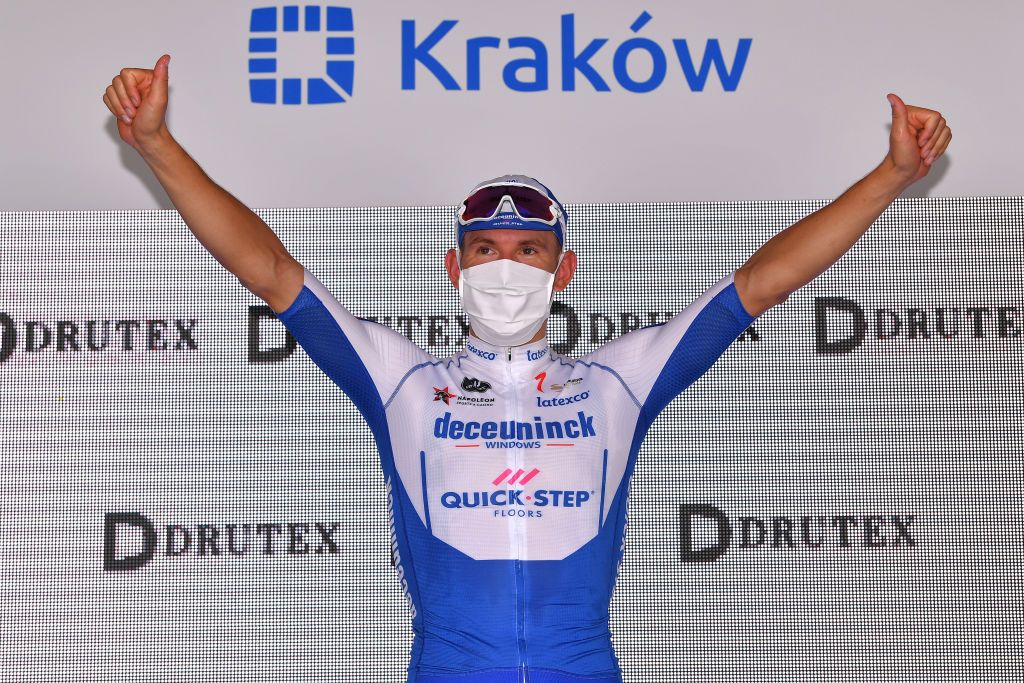 KRAKOW POLAND AUGUST 09 Podium Davide Ballerini of Italy and Team Deceuninck QuickStep Celebration during the 77th Tour of Poland 2020 Stage 5 a 188km stage from Zakopane to Krakow TourdePologne tdp20 on August 09 2020 in Krakow Poland Photo by Luc ClaessenGetty Images