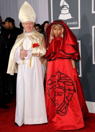 Nicki Minaj with a Pope impersonator at the Grammys