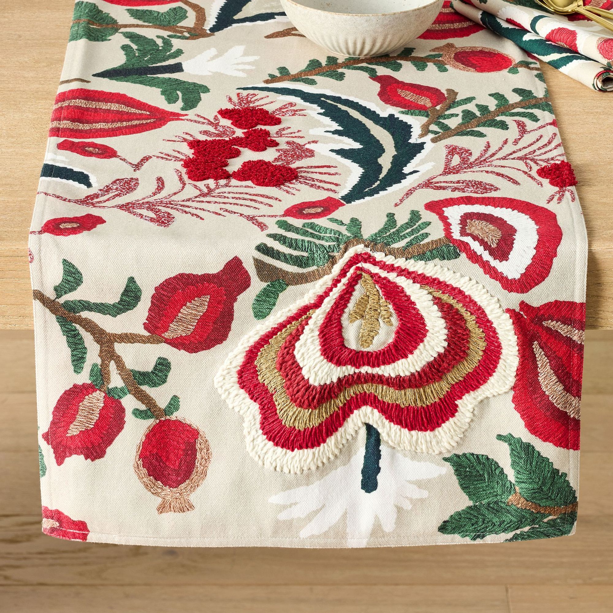 Red and white botanical embroidered table runner