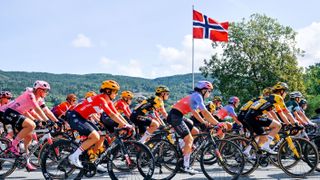 VIKERSUND, NORWAY - AUGUST 24: (L-R) Rebecca Koerner of Denmark and Uno-X Pro Cycling Team and Olivia Baril of Canada and UAE Team Adq and a general view of the peloton competing during the 9th Tour of Scandinavia 2023 - Battle Of The North, Stage 2 a 150.5km stage from Vikersund to Norefjell 791m / #UCIWWT / on August 24, 2023 in Vikersund, Norway. (Photo by Luc Claessen/Getty Images)