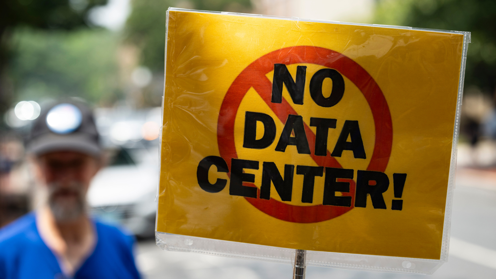 a 'No Data Center!' sign at a protest