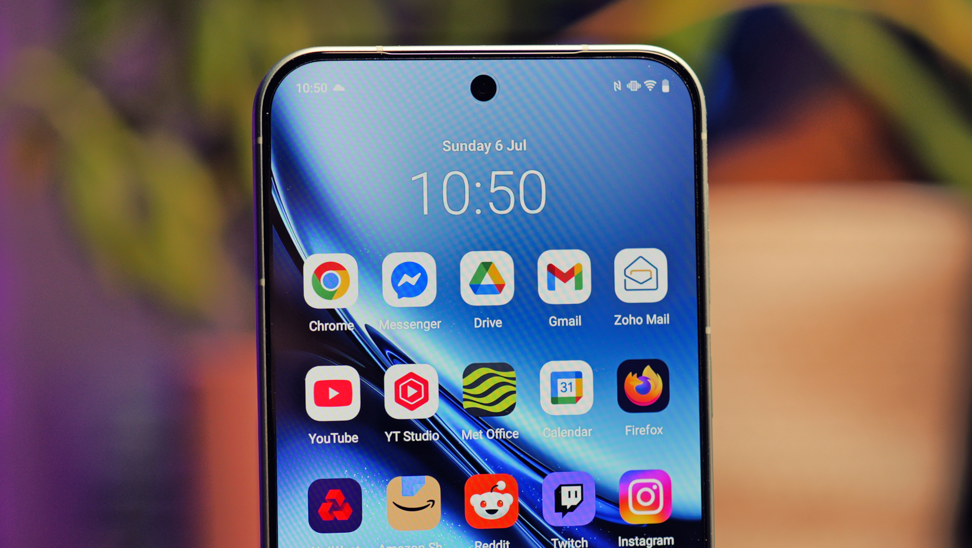 Vivo X200 FE phone close up of screen showing time and date
