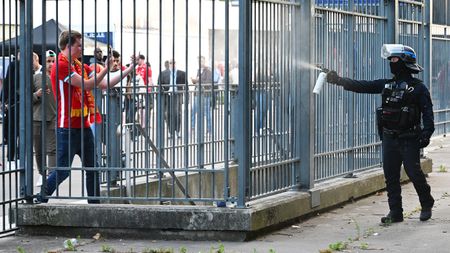 Police sprayed tear gas at Liverpool fans outside the Stade de France