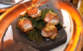 Wild salmon au sel, topped with gold leaf