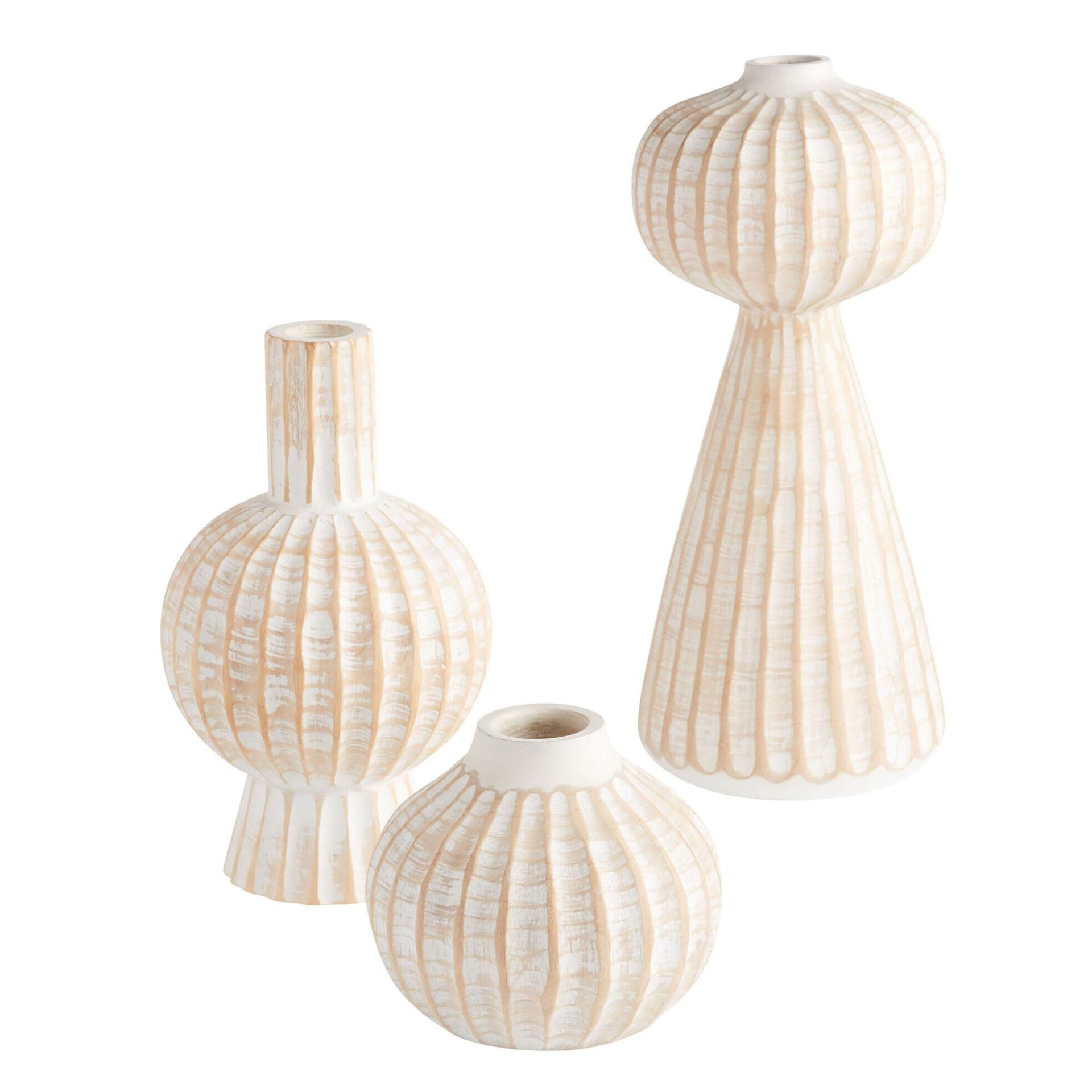 Tiga vas abstrak putih