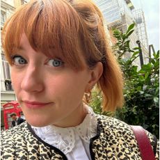 headshot of author with red hair