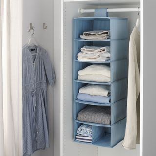 inside hanging wardrobe solution for folded clothes