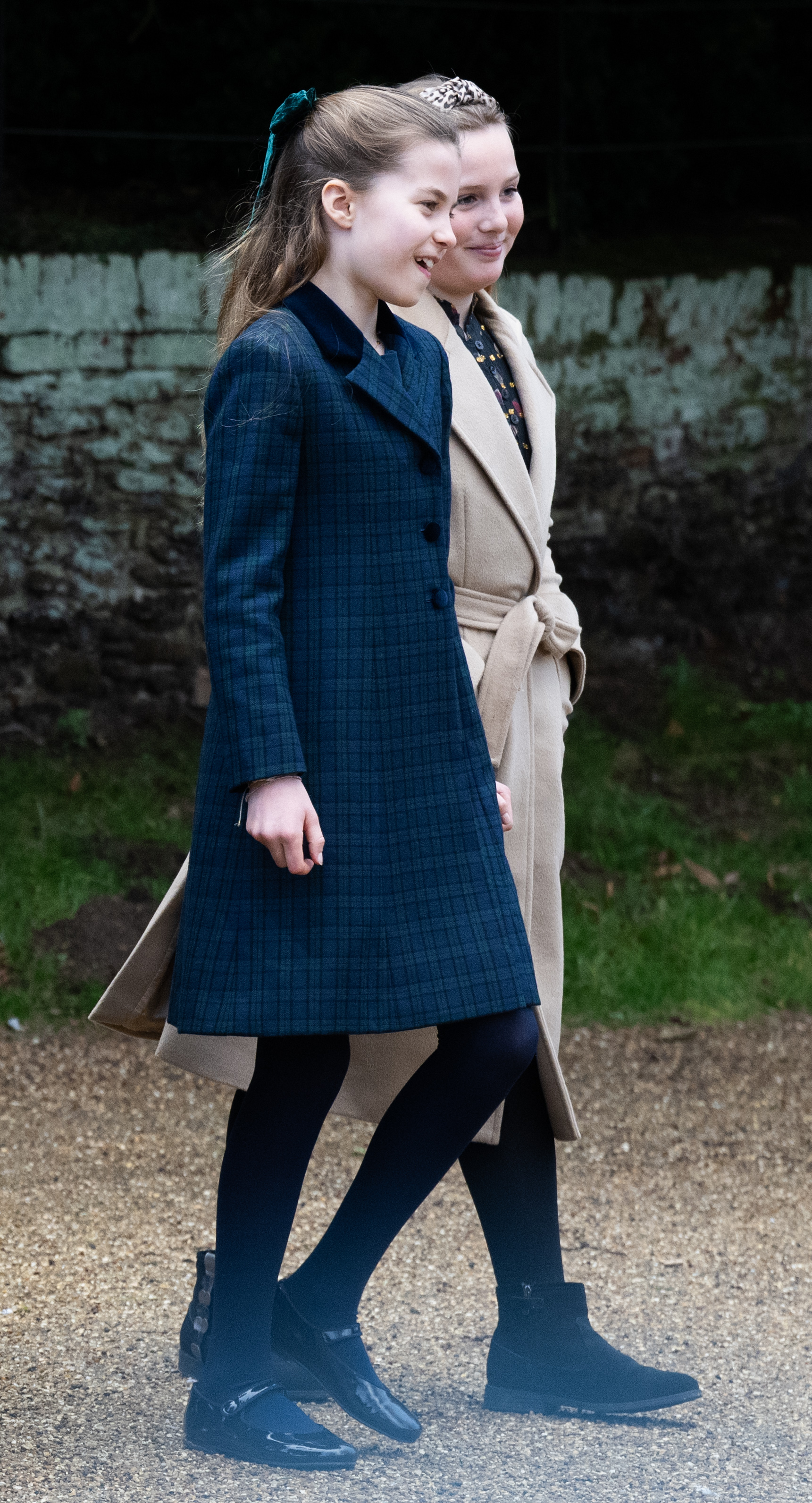 Princess Charlotte and Mia Tindall walking next to each other on Christmas 2024