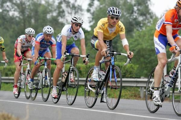 Yellow jersey wearer Vitaliy Buts (Ukraine) riding in the safety of the bunch.