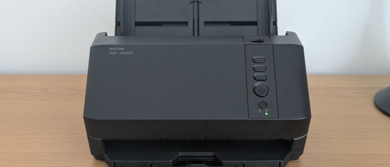 The Ricoh SP-2230N on a desk