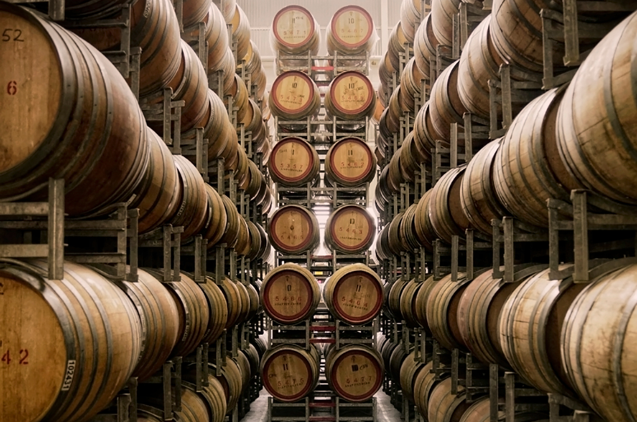 Rows of whisky barrels in a bond store