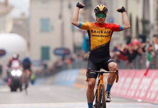 Team Bahrain rider Slovenias Jan Tratnik celebrates as he crosses the finish line to win in the 16th stage of the Giro dItalia 2020 cycling race 229 km between Udine and San Daniele in Udine on October 20 2020 Photo by Luca Bettini AFP Photo by LUCA BETTINIAFP via Getty Images