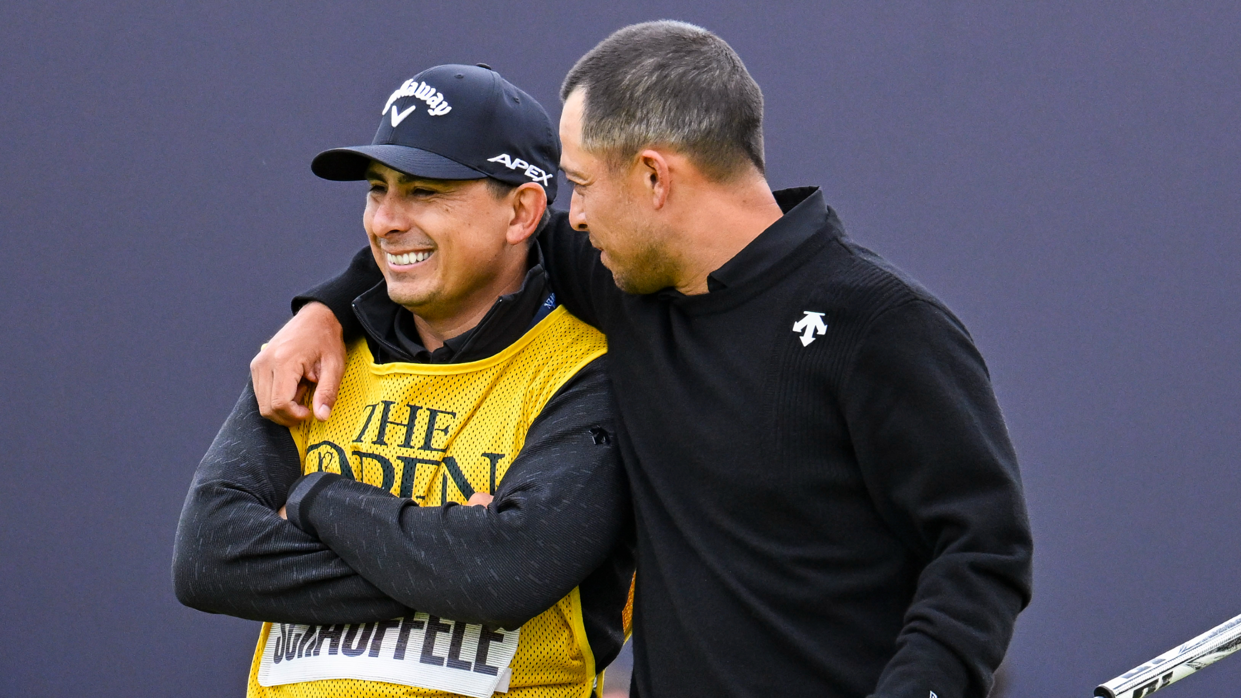 Xander Schauffele and Austin Kaiser react to victory in The Open