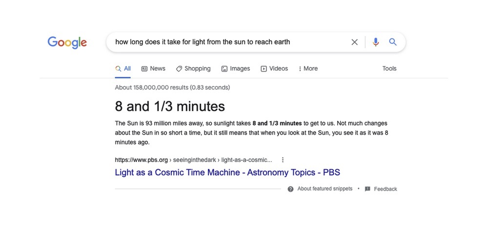 A featured snippet about the time it takes light to reach Earth on Google.