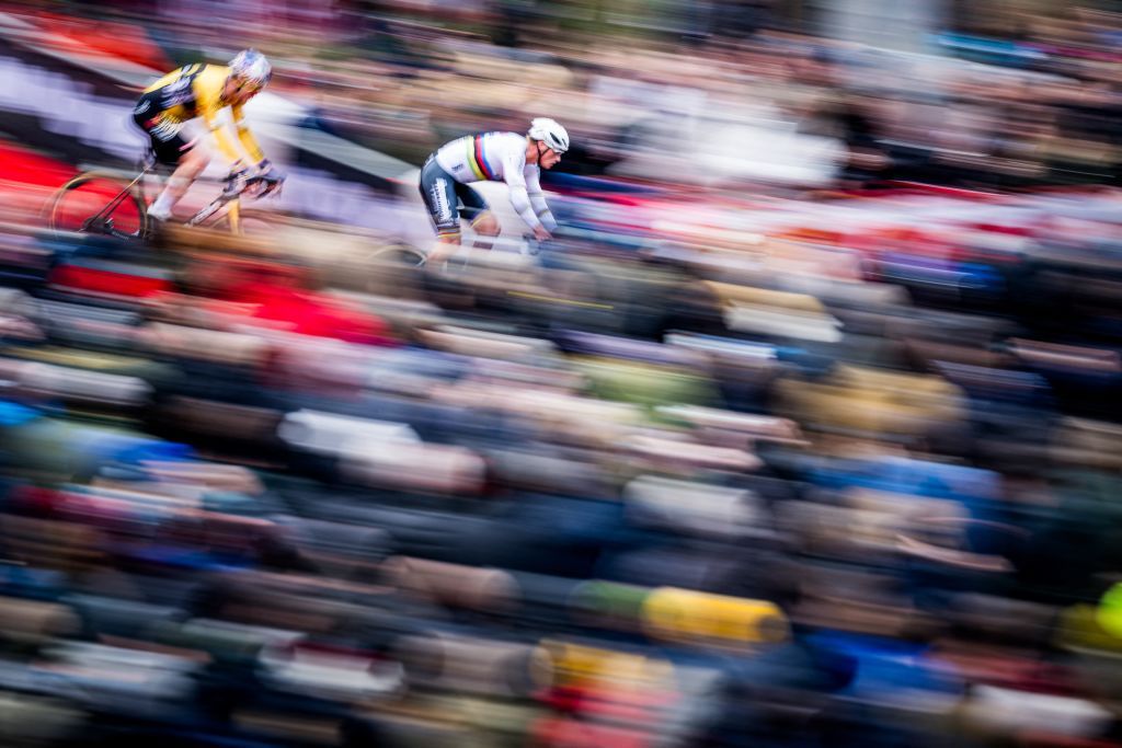 Dutch rider Mathieu Van Der Poel rides ahead of Belgian rider Wout van Aert during the Men&#039;s Elite race at the UCI World Cup Cyclocross cycling event stage 9 (out of 14) in Antwerp, on December 23, 2023. (Photo by JASPER JACOBS / Belga / AFP) / Belgium OUT