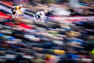 Dutch rider Mathieu Van Der Poel rides ahead of Belgian rider Wout van Aert during the Men's Elite race at the UCI World Cup Cyclocross cycling event stage 9 (out of 14) in Antwerp, on December 23, 2023. (Photo by JASPER JACOBS / Belga / AFP) / Belgium OUT