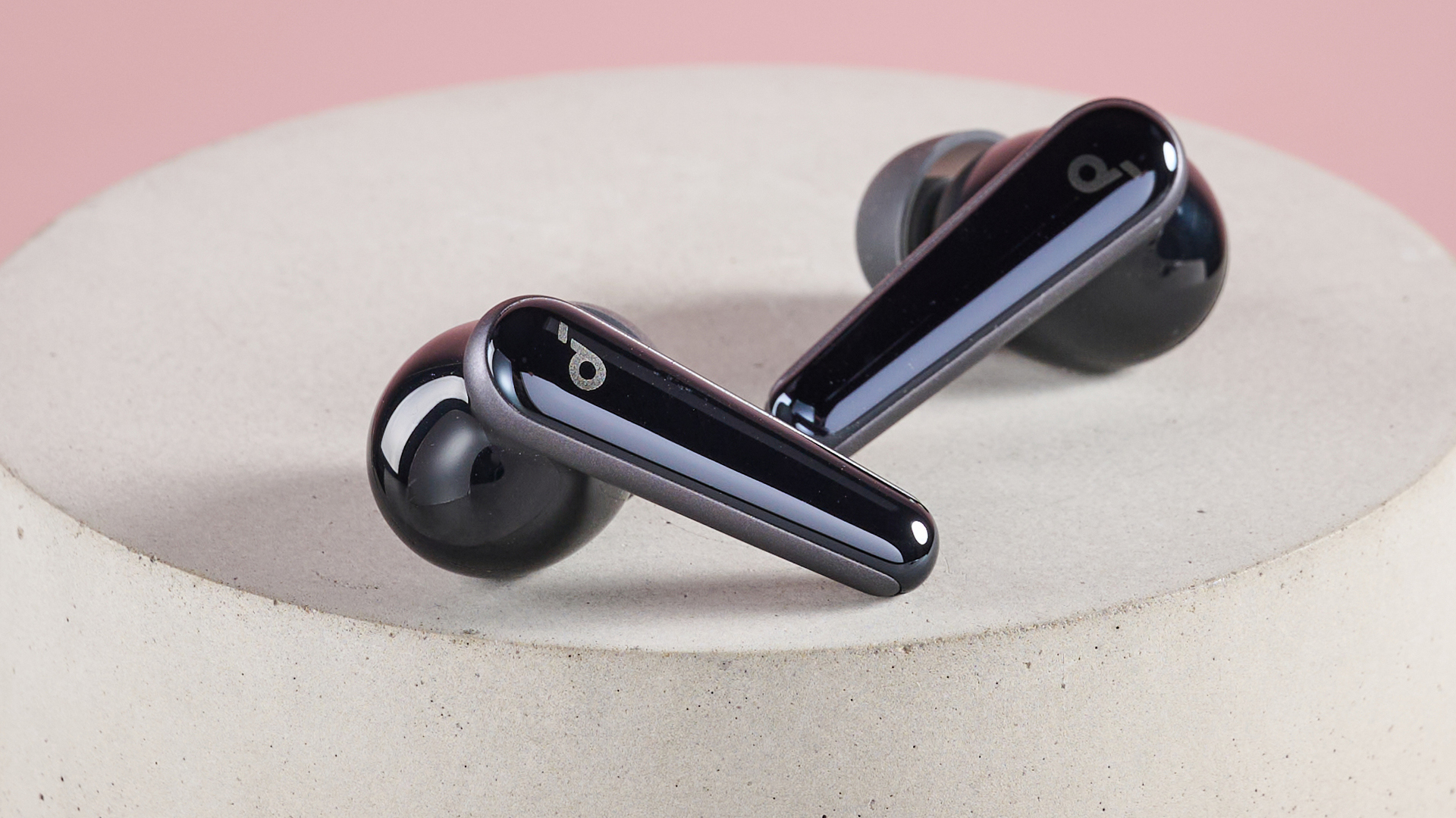 Anker Soundcore Liberty 5 buds on circular surface