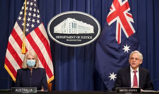 US Attorney General Merrick Garland and Australian Minister for Home Affairs Karen Andrews speak at a press conference at the US Department of Justice
