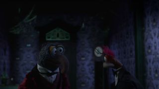 Pepe and Gonzo in front of clock going backwards