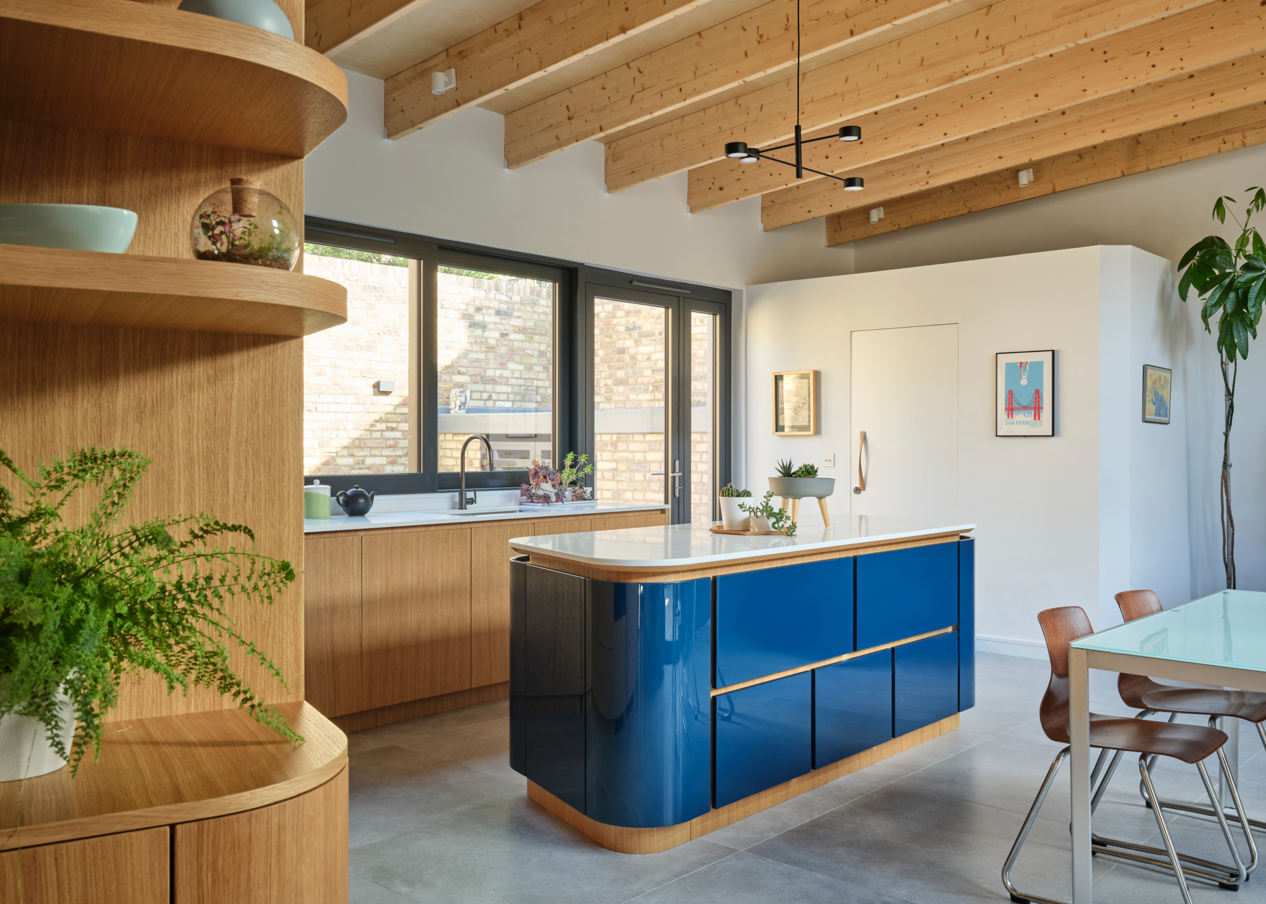 The new kitchen has mid-century inspired joinery and detailing