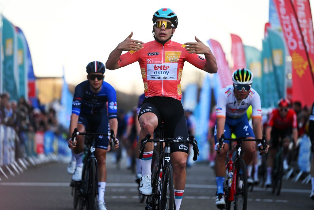 BESSEGES FRANCE FEBRUARY 03 Arnaud De Lie of Belgium and Team Lotto Dstny Orange leader Jersey celebrates at finish line as stage winner during the 53rd Etoile de Besseges Tour Du Gard 2023 Stage 3 a 16971km stage from Bessges to Bessges EDB2021 on February 03 2023 in Besseges France Photo by Luc ClaessenGetty Images