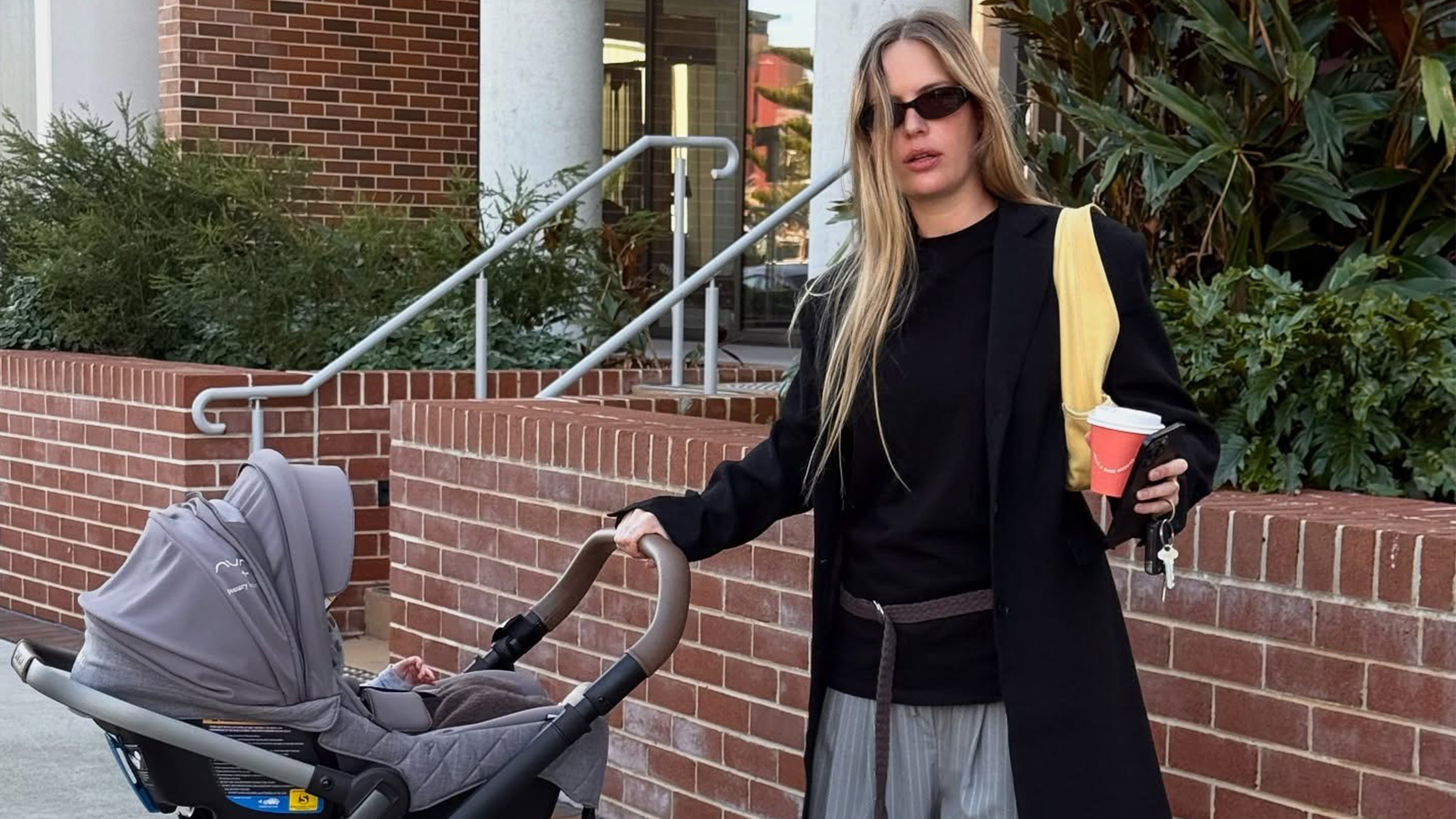 Ailie Smith with a baby stroller. 
