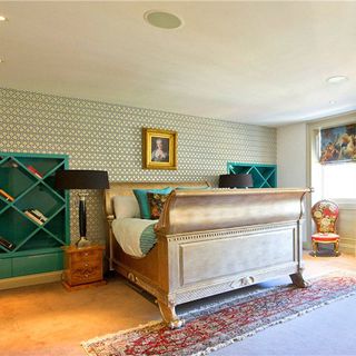 master bedroom with bed cushions and shelves