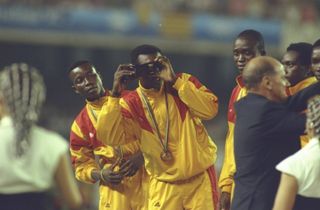 Ghana players receive their bronze medals for football at the Barcelona Olympics in 1992.