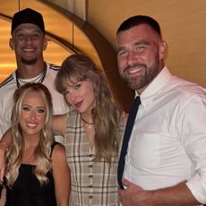 Taylor Swift poses with her Kansas City Chiefs friends while out to dinner