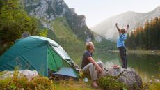 man and child camping